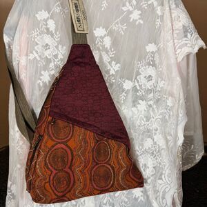 Maruca “Gogo” Sling Bag – Burnt Orange Spiral & Burgundy Mixed Print | NWT
